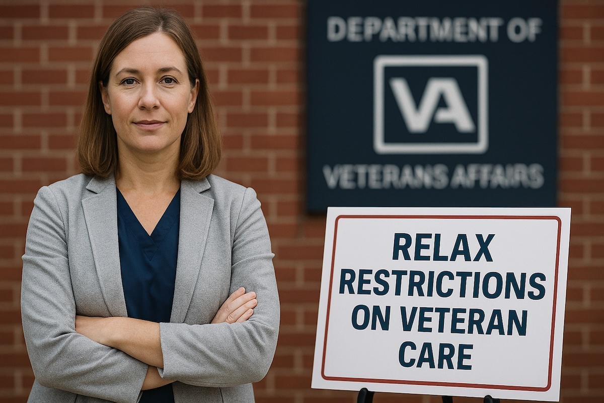 American nurse practitioner standing in front of VA building with sign advocating for expanded practice authority